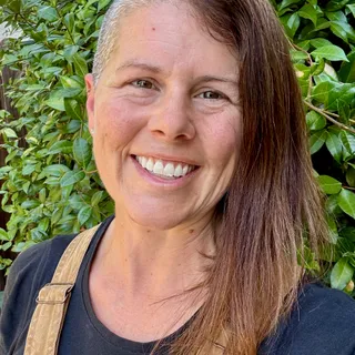 Felicia Parilo, Owner of Pleasant Air Company, in her work overalls